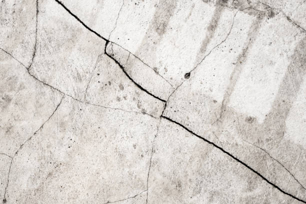 istock Grunge cracked concrete wall texture abstract background 1601981967
