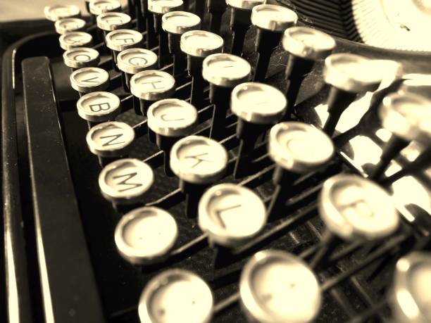 istock Closeup of antique typewriter keys 1601985763