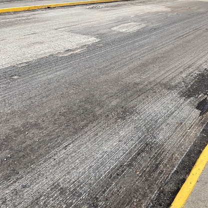 View of a street of Caracas city with the asphalt removed to be replaced with new asphalt.