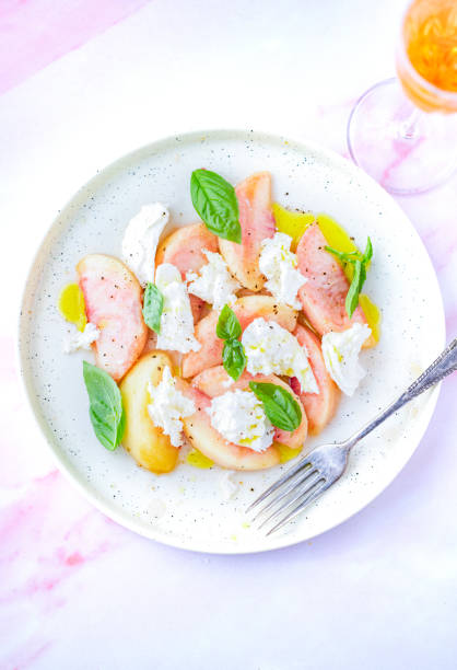 istock Fresh Peaches and Mozzarella Cheese Caprese Salad 1602164887