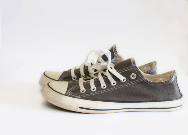 istock gray sneakers isolated on white background 1602172978