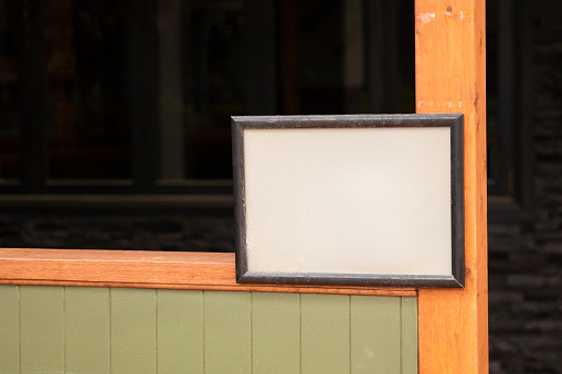 A blank A4 size blank notice board, ready to be filled with information or announcements a needed.