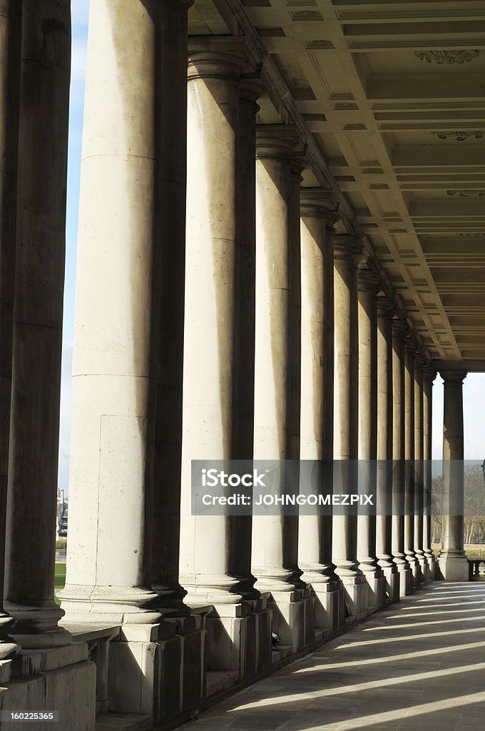 Columns, Old Royal Naval College, Greenwich, UK Stone columns in a row at the Old Royal Naval College, Greenwich, UK. Architectural Column Stock Photo