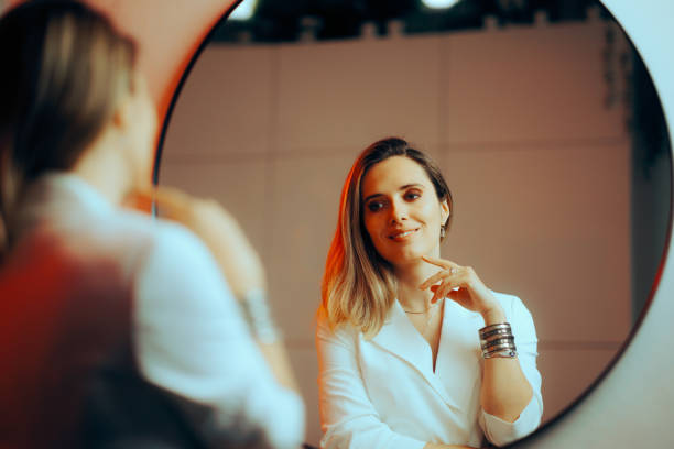 istock Happy Confident Woman Looking in the Mirror 1602289122