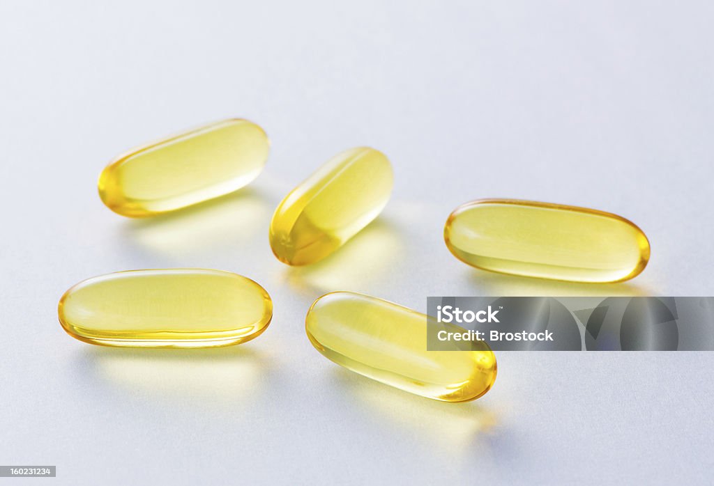 Vitamin pill Cod liver oil omega 3 capsules. Alternative Medicine Stock Photo