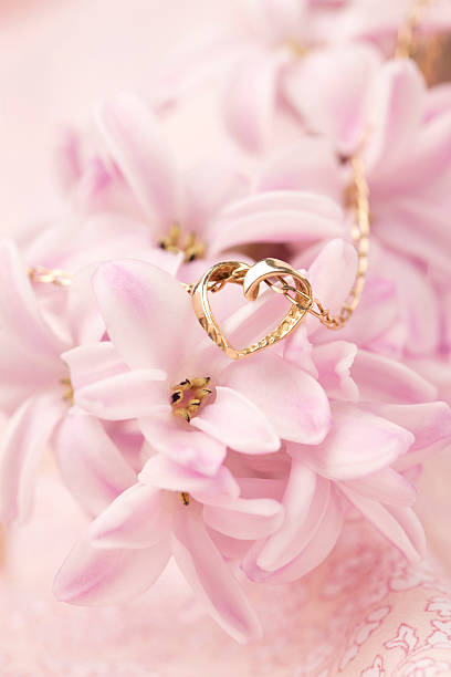 istock Gold necklace with heart on hyacinth 160231665