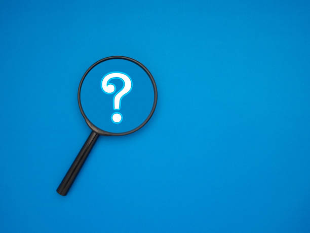 istock A magnifying glass with a question mark symbol over a blue background 1602318676