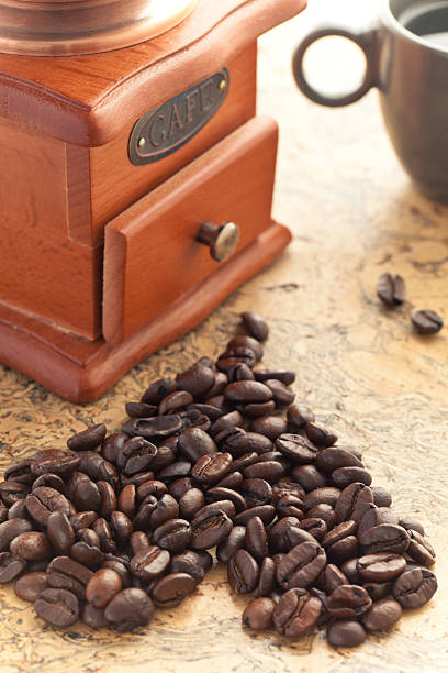 Неаrt with cup and coffee grinder stock photo
