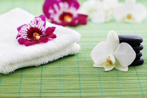 istock Stones, Towel and Orchids Wellness Concept 160233920