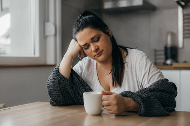 istock woman at home 1602358177