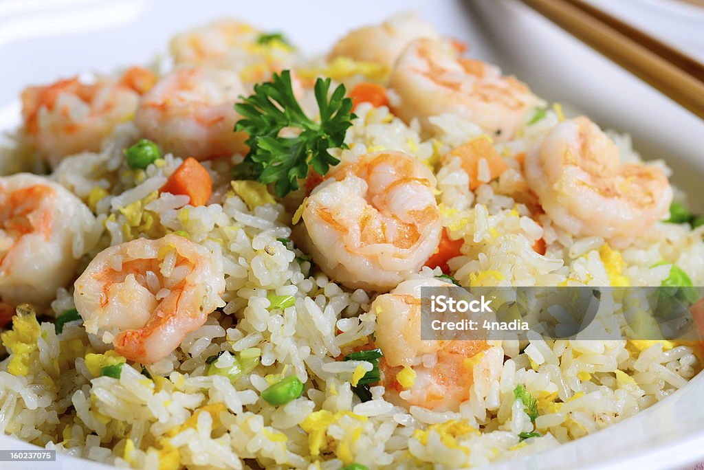 Shrimp fried rice delicious shrimp fried rice on a plate Shrimp - Seafood Stock Photo