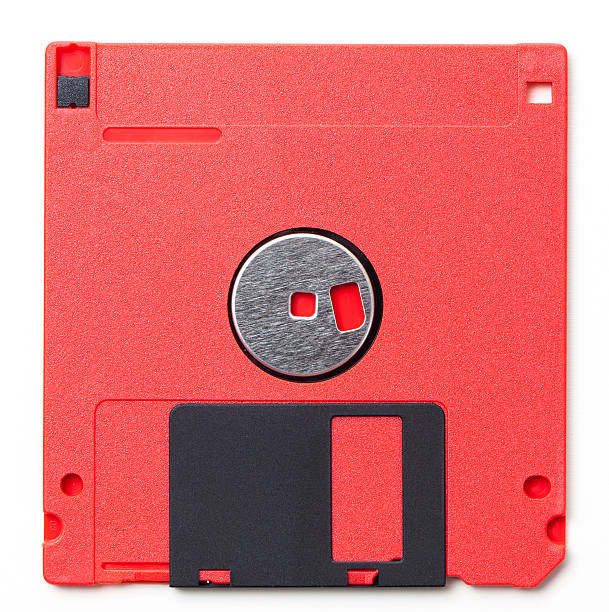 Red 3.5 inch floppy disk from the late 80s/early 90s stock photo
