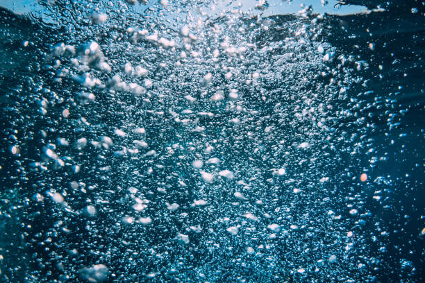 istock Underwater blue texture in ocean. Bubbles in transparent sea. 1602383180