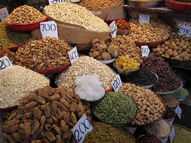 Dried fruits and spices on display. II stock photo