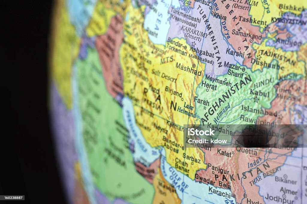 Afghanistan and the World Photo of Afghanistan on a globe to illustrate its global impact Afghanistan Stock Photo