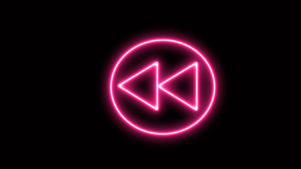 istock Neon shine fast backward button with neon circle. Neon glowing backward button. 1602394848