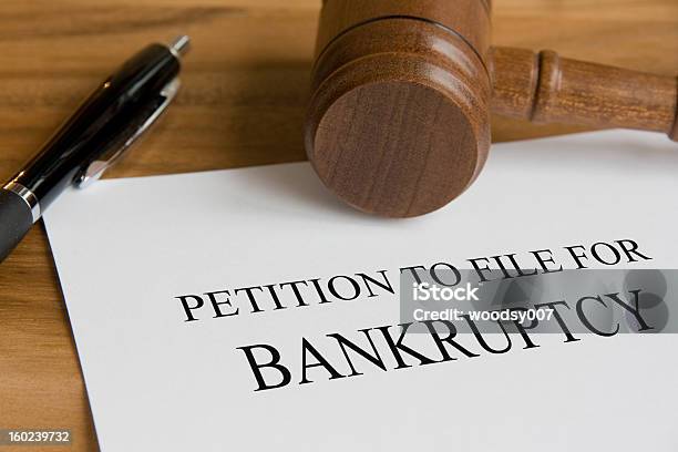 A Petition To File For Bankruptcy Note Stock Photo - Download Image Now - Courthouse, Bankruptcy, Paper