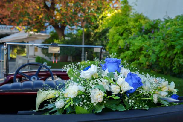 istock Vintage Wedding Car Decorated with Flowers 1602411817