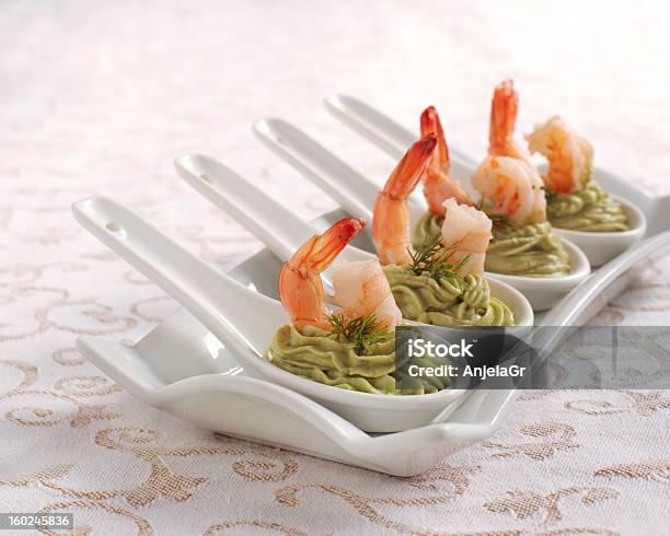 Avocado Cream And Shrimp In Spoon Stock Photo - Download Image Now - Appetizer, Avocado, Buffet
