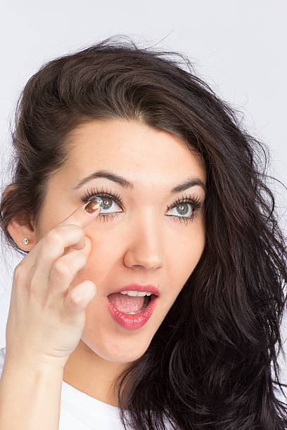 istock Young woman with contact lense 160245933