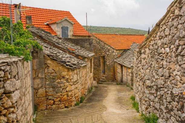 A street of historic stone houses in Loziscz Village in the centre of Brac Island in Croatia