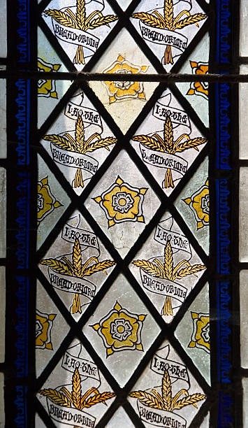 istock Gold and blue stained glass window 160248898