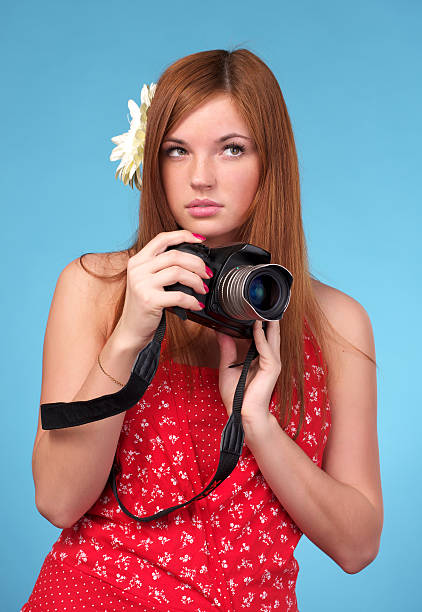 istock Beautiful young female photographer 160249768