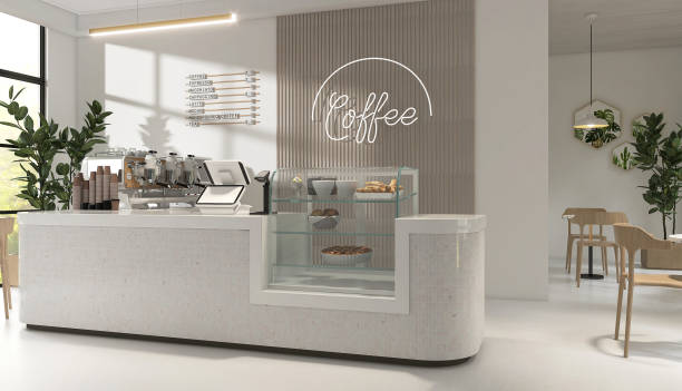 istock Modern luxury design cafe, mosaic tile white round corner counter, cake display, espresso machine, cash register, table, chair by window to tropical garden 1602524731