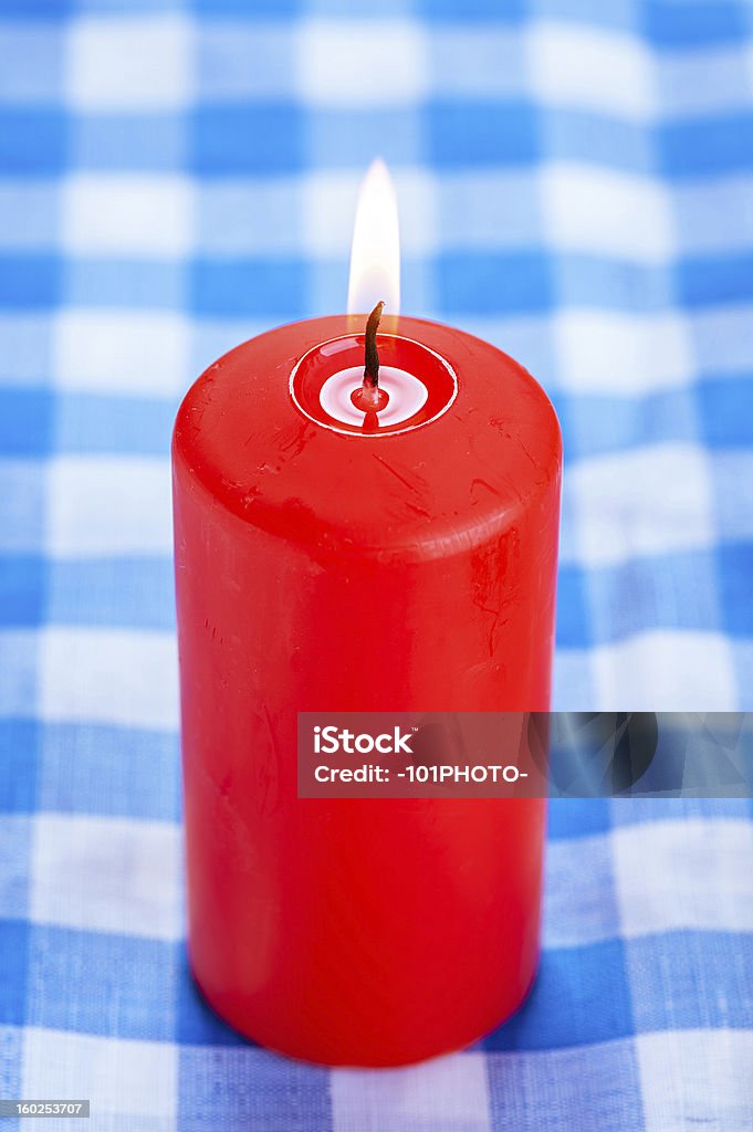 Big red candela burning - Foto stock royalty-free di Blu