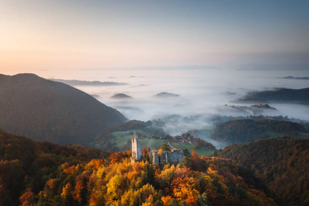 istock Old Ruins In Autumn Forest 1602540579