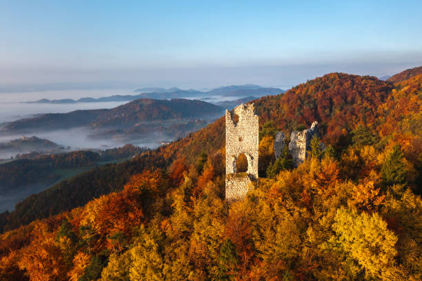 istock Old Ruins In Autumn Forest 1602540765