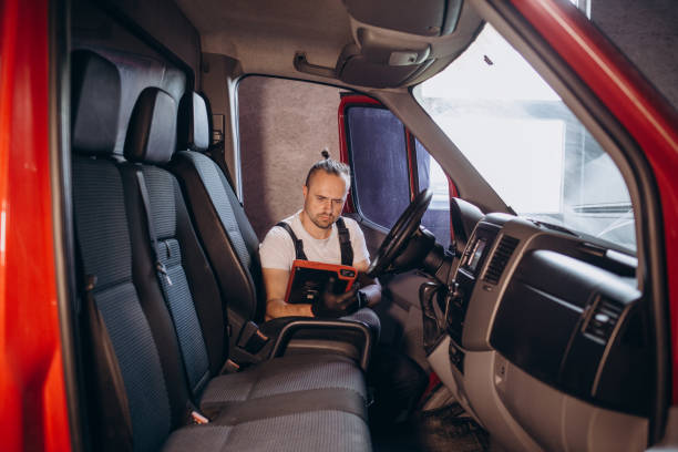 istock An auto mechanic sitting in a pickup truck and using tablet for problem diagnostics 1602545872