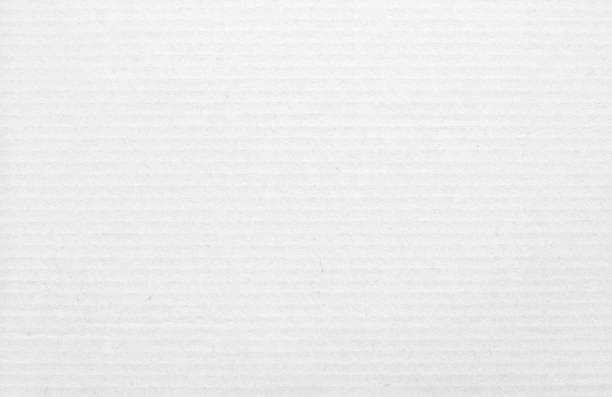 istock White cardboard sheet texture background, detail of recycle paper box pattern. 1602553835