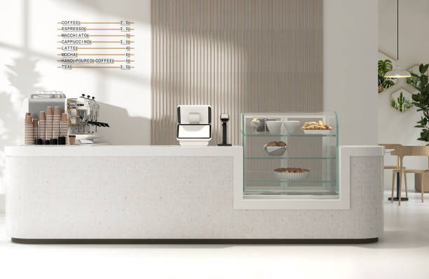 istock Modern luxury design cafe, mosaic tile white round corner counter, cake display, espresso machine, cash register, table, chair by window 1602569607