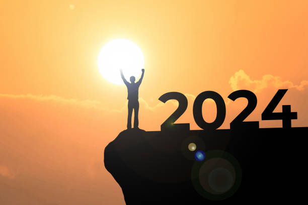 istock Man standing on the top, 2024 for New Year 1602587948