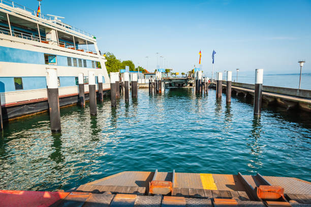 istock Ferry coming to port for loading or unloading by a port pier 1602598892