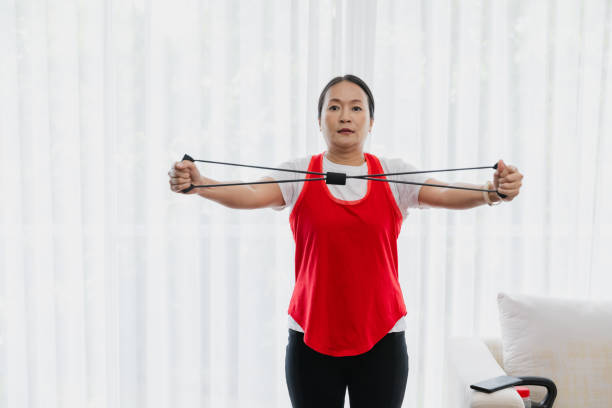 istock Mature woman exercise at home. 1602635587