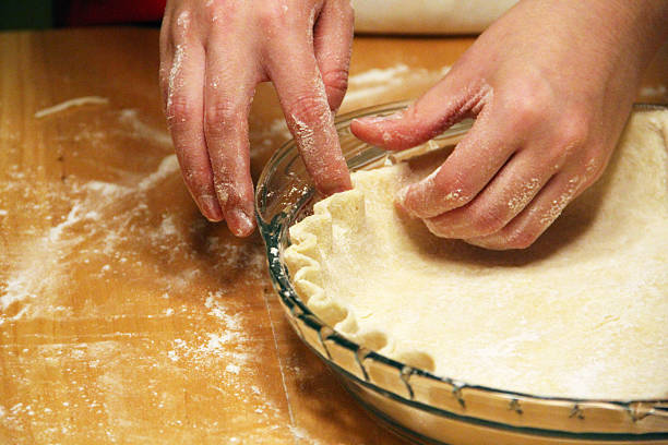 Crimping Pie Crust Edges stock photo