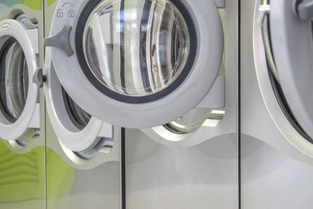 istock Laundromat Washing Machine: Artistic Snapshot and selected focus. 1602672051