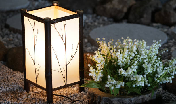 Lantern light Lantern light illuminating the ground of the Japan garden at night garden lights candle stock pictures, royalty-free photos & images