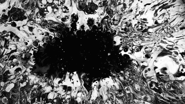 istock Ink splatter wet swirls dark fluid spots pattern 1602699441