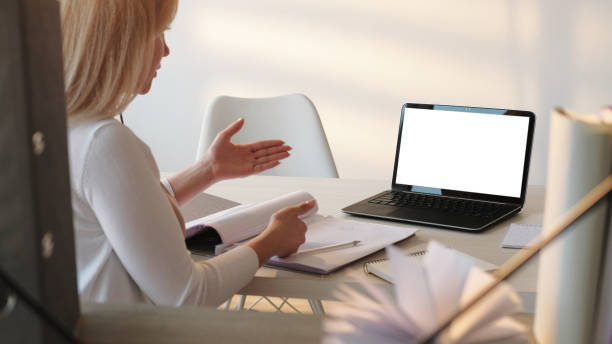 istock Online consultation internet coaching woman laptop 1602700585