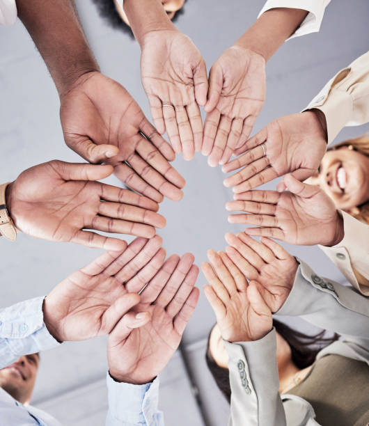 istock Hands, circle and together in low angle for business people with teamwork, motivation and solidarity in office. Women, happiness and open palm with smile, team building and support for company goals 1602701688