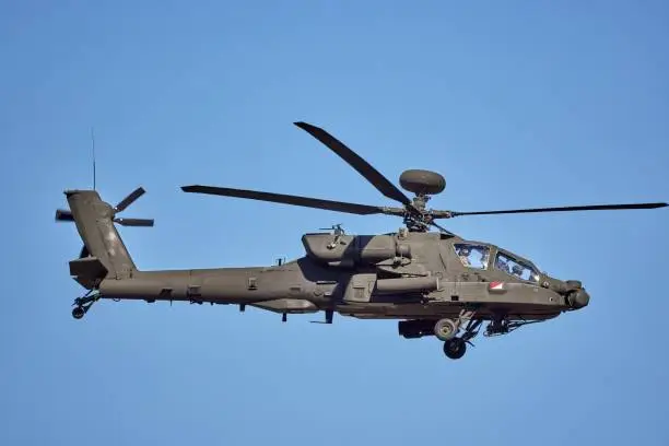 AH 64 Apache - military helicopter performing a demonstration flight.