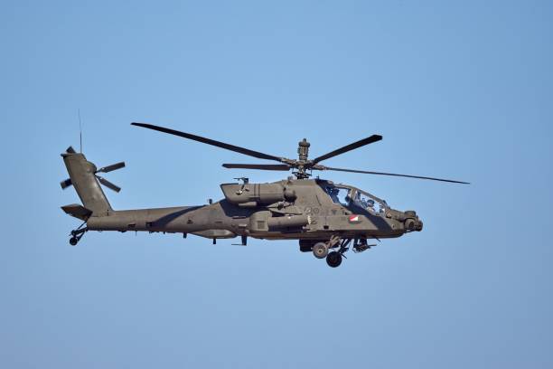 istock AH 64 Apache - military helicopter performing a demonstration flight 1602702766