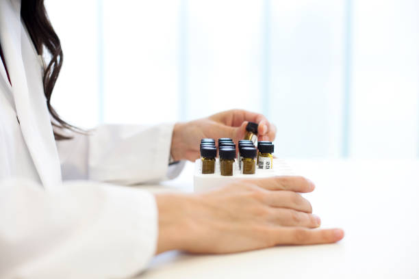 istock Scientist manipulating a test tube in a laboratory. 1602703350