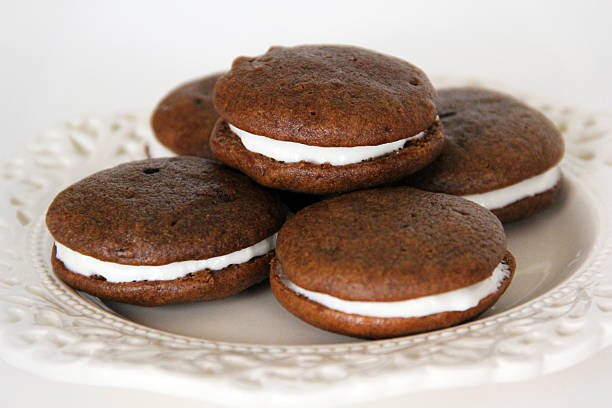 Close-Up of Chocolate Whoopie Pies on Plate stock photo