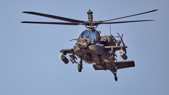 AH 64 Apache - military helicopter performing a demonstration flight
