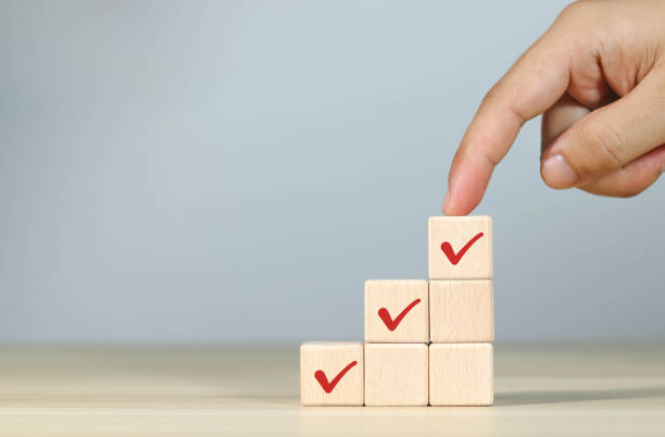 istock Grab a wooden block with a checklist. 1602791755