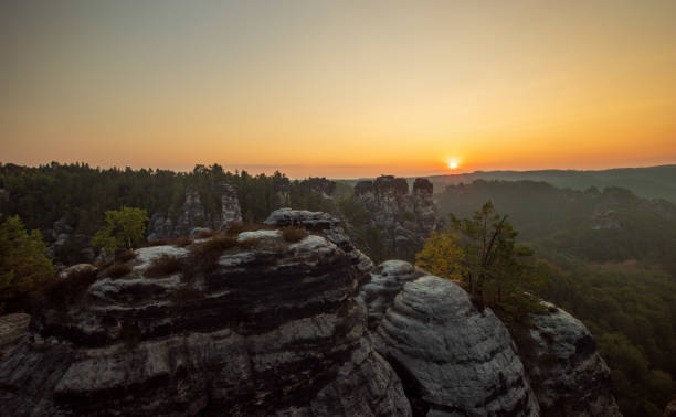 istock the sun rises at the elbsandsteingebirge 1602832111